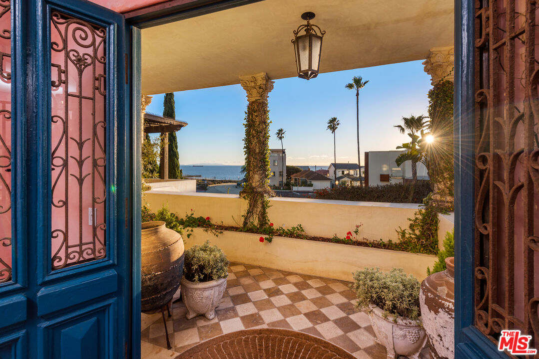 7546 Rindge Avenue Playa del Rey, CA 90293 - Photo 40 of 67 a view of a balcony with two potted plants