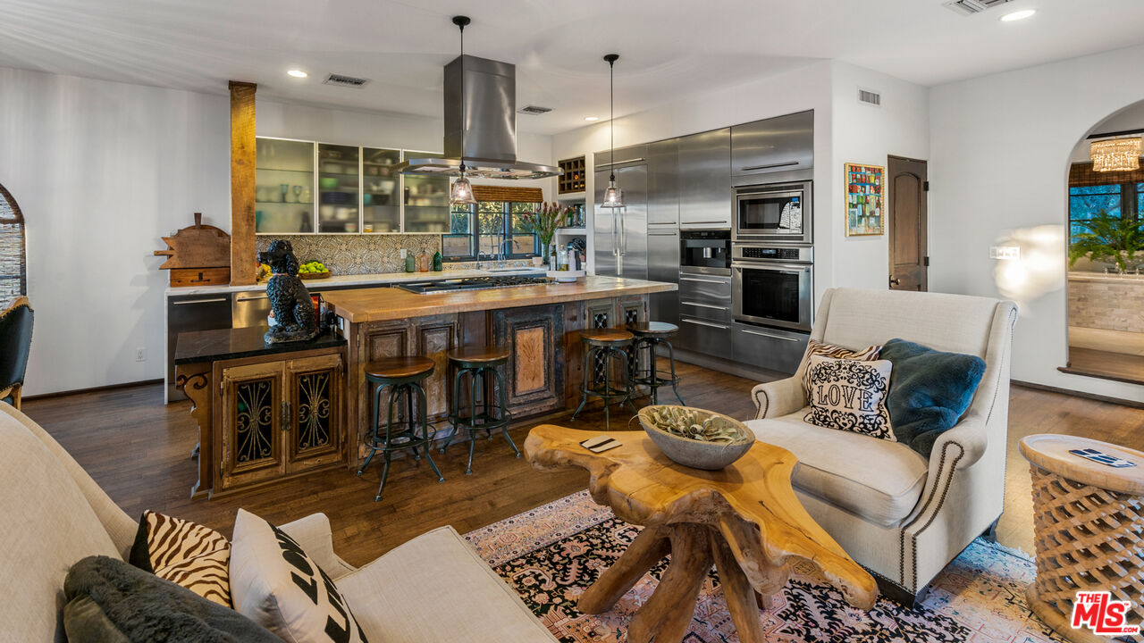 7546 Rindge Avenue Playa del Rey, CA 90293 - Photo 45 of 67 a living room with lots of furniture and kitchen view