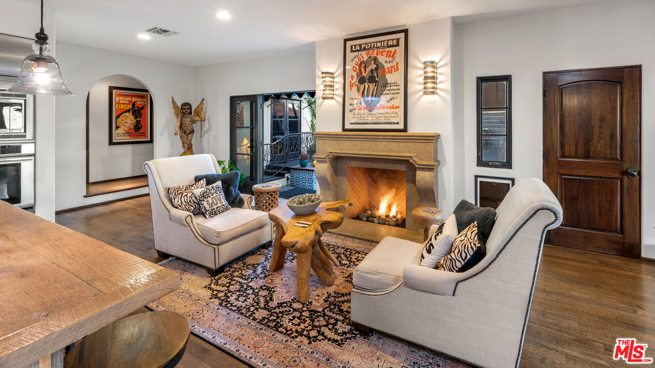7546 Rindge Avenue Playa del Rey, CA 90293 - Photo 49 of 67 a living room with furniture and a fireplace