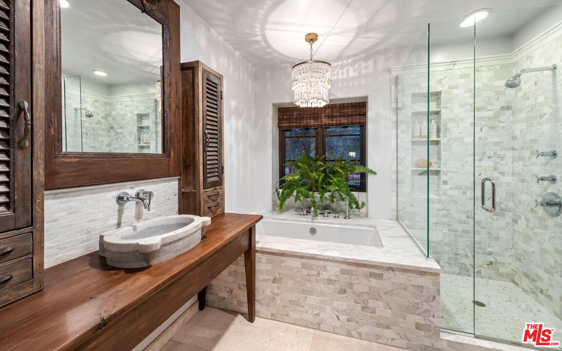 7546 Rindge Avenue Playa del Rey, CA 90293 - Photo 54 of 67 a bathroom with a tub shower and sink