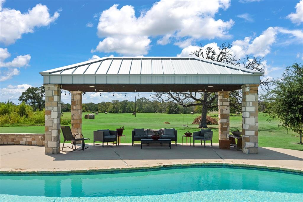 3759 Cr 126 Road Bedias, TX 77831 - Photo 20 of 38 a view of a porch with furniture and garden