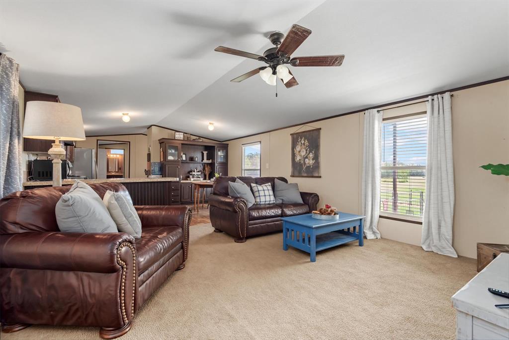 3759 Cr 126 Road Bedias, TX 77831 - Photo 25 of 38 a living room with furniture and a large window