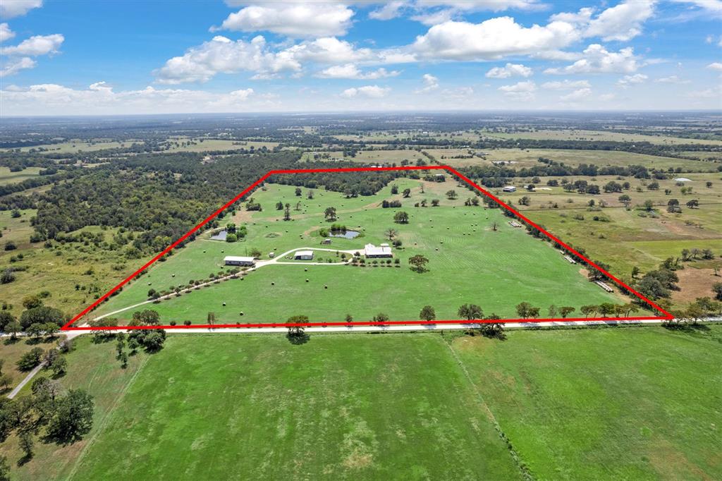 3759 Cr 126 Road Bedias, TX 77831 - Photo 3 of 38 a view of a multi story building