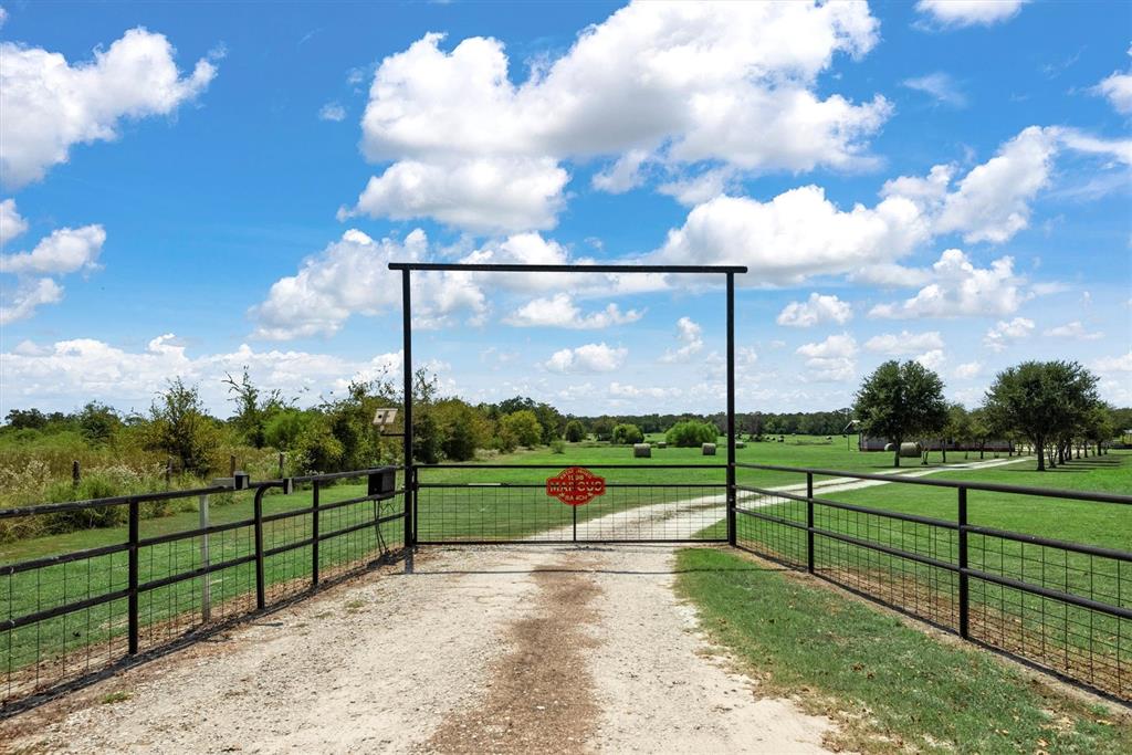 3759 Cr 126 Road Bedias, TX 77831 - Photo 34 of 38 a view of a park with iron fence