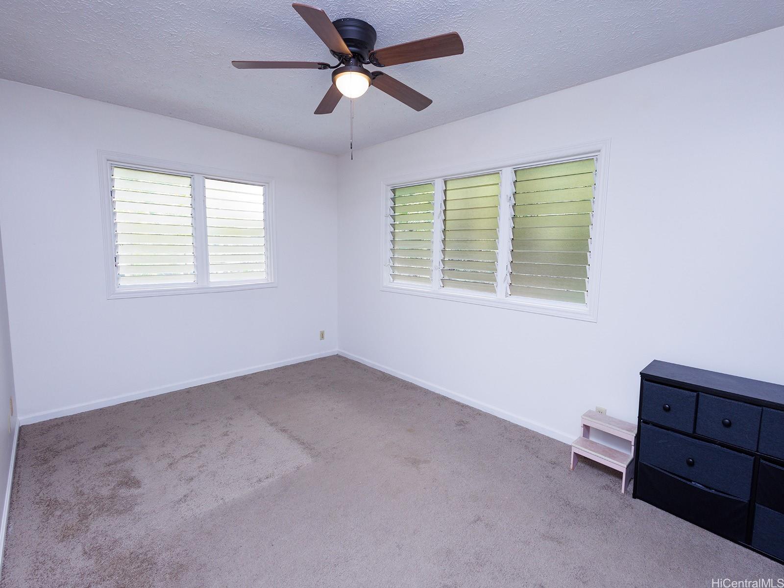 51-450 Kekio Road Kaaawa, HI 96730 - Photo 21 of 25 a view of an empty room with a window