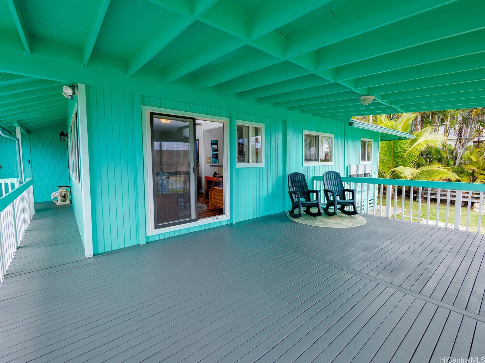 51-450 Kekio Road Kaaawa, HI 96730 - Photo 3 of 25 a view of a porch with wooden floor and outdoor space