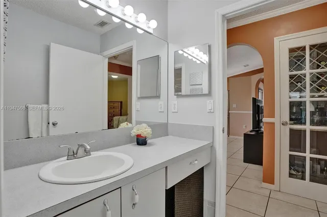 a bedroom with a bed and a shower