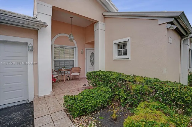 a livingroom with furniture and window
