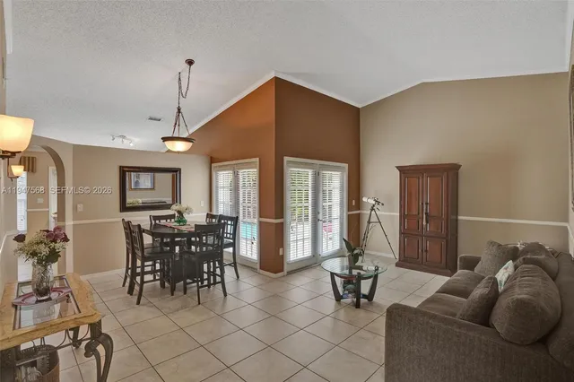 a view of a livingroom with furniture and window