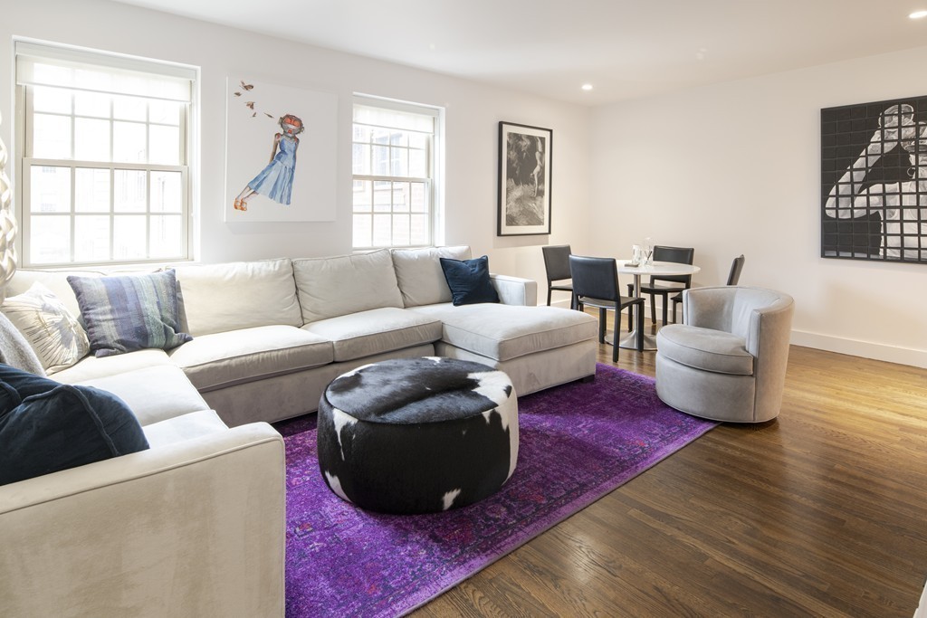 1490 Beacon Street, Unit 4 Brookline, MA 02446 - Photo 12 of 26 a living room with furniture wooden floor and window