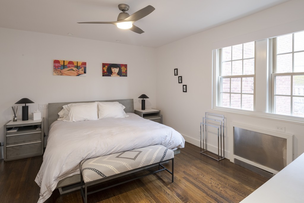 1490 Beacon Street, Unit 4 Brookline, MA 02446 - Photo 19 of 26 a bedroom with a bed and a window
