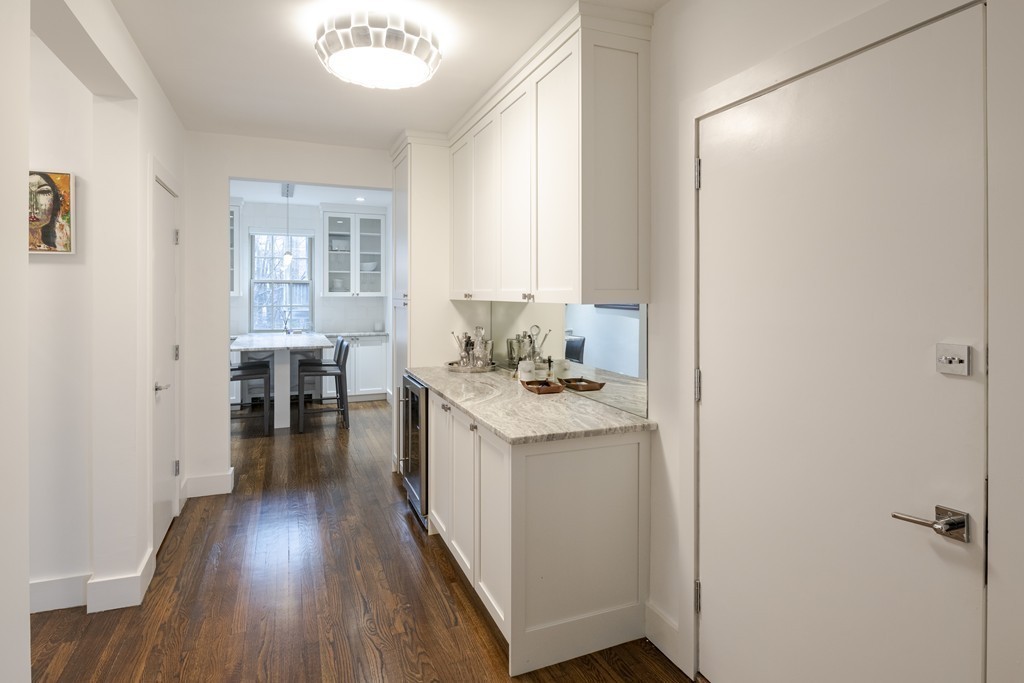 1490 Beacon Street, Unit 4 Brookline, MA 02446 - Photo 4 of 26 a kitchen with sink and refrigerator