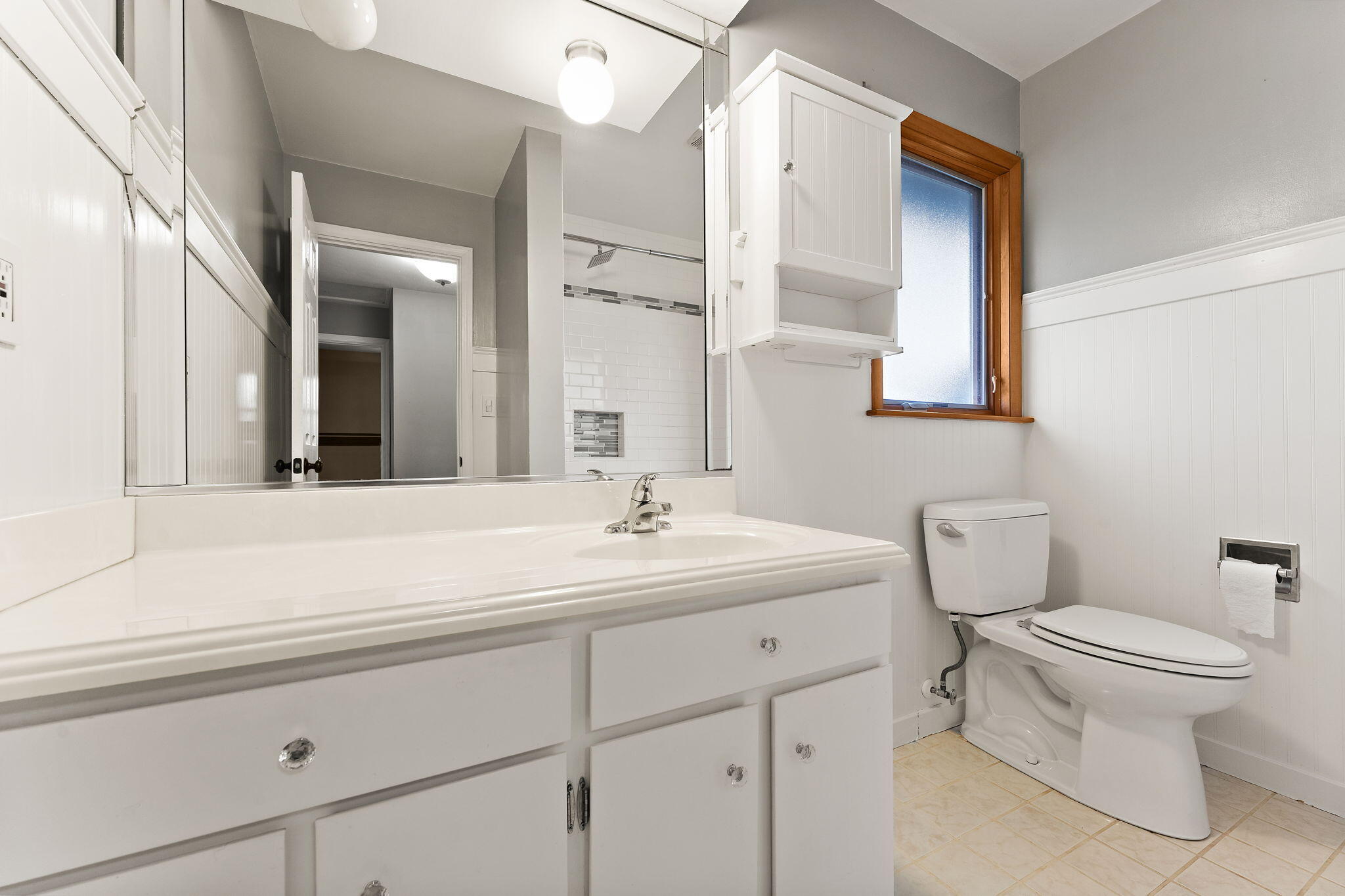 9217 Grace Street Highland, IN 46322 - Photo 16 of 29 a bathroom with a sink and a toilet