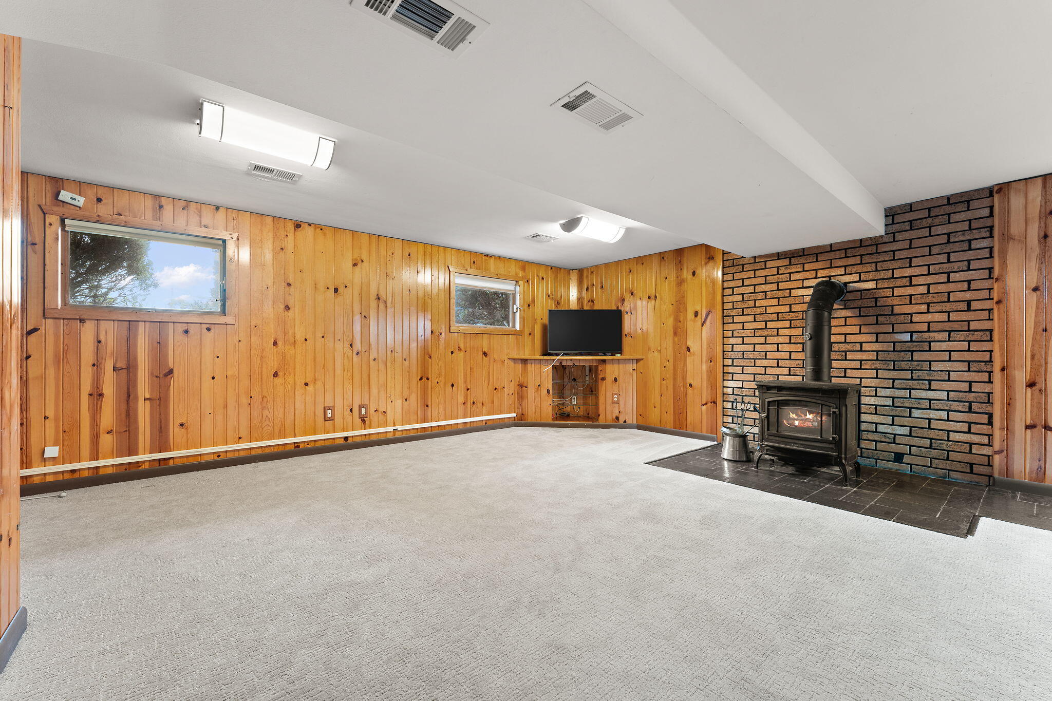 9217 Grace Street Highland, IN 46322 - Photo 18 of 29 a view of an empty room with a fireplace