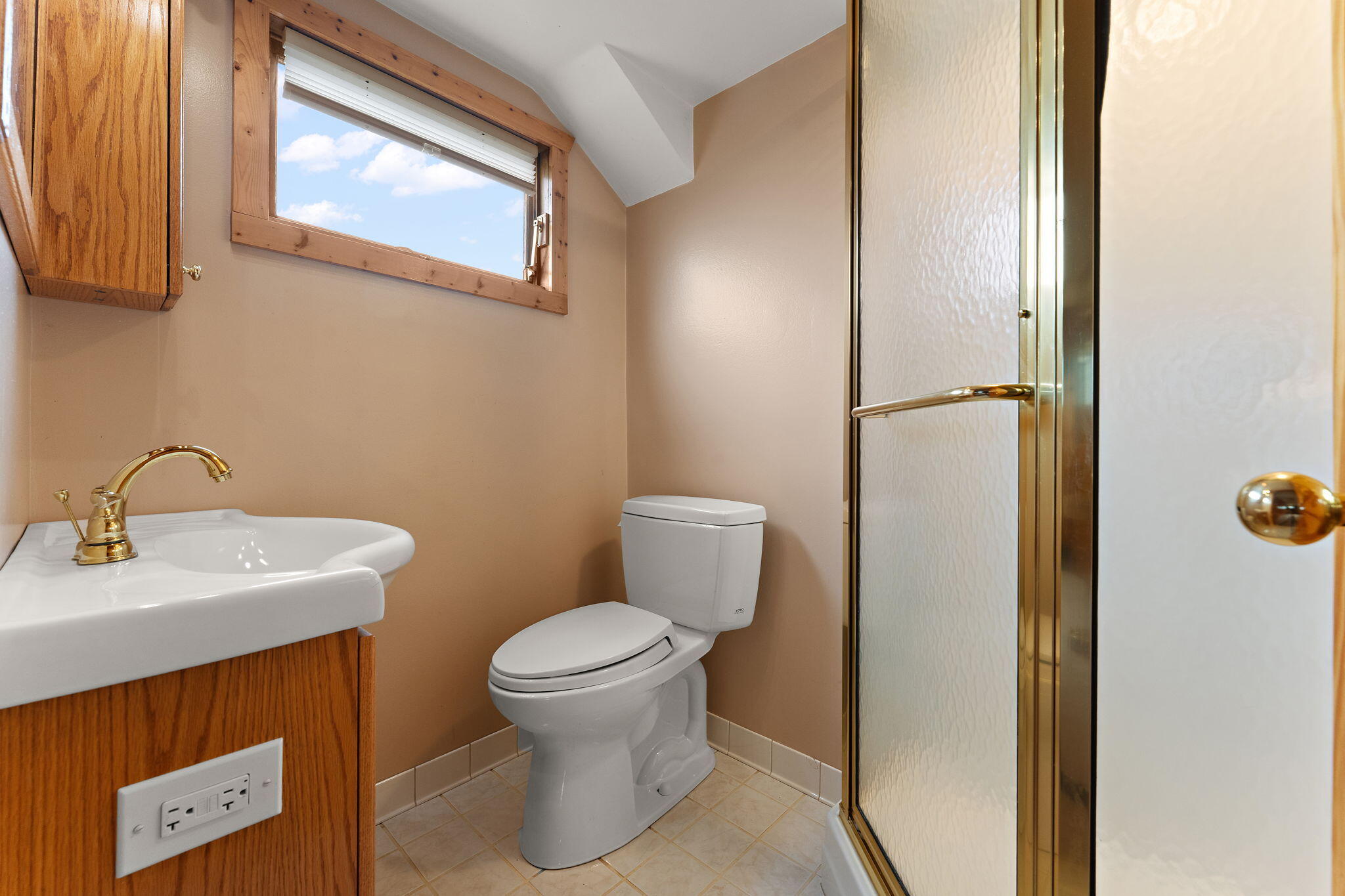 9217 Grace Street Highland, IN 46322 - Photo 24 of 29 a bathroom with a toilet a sink and mirror