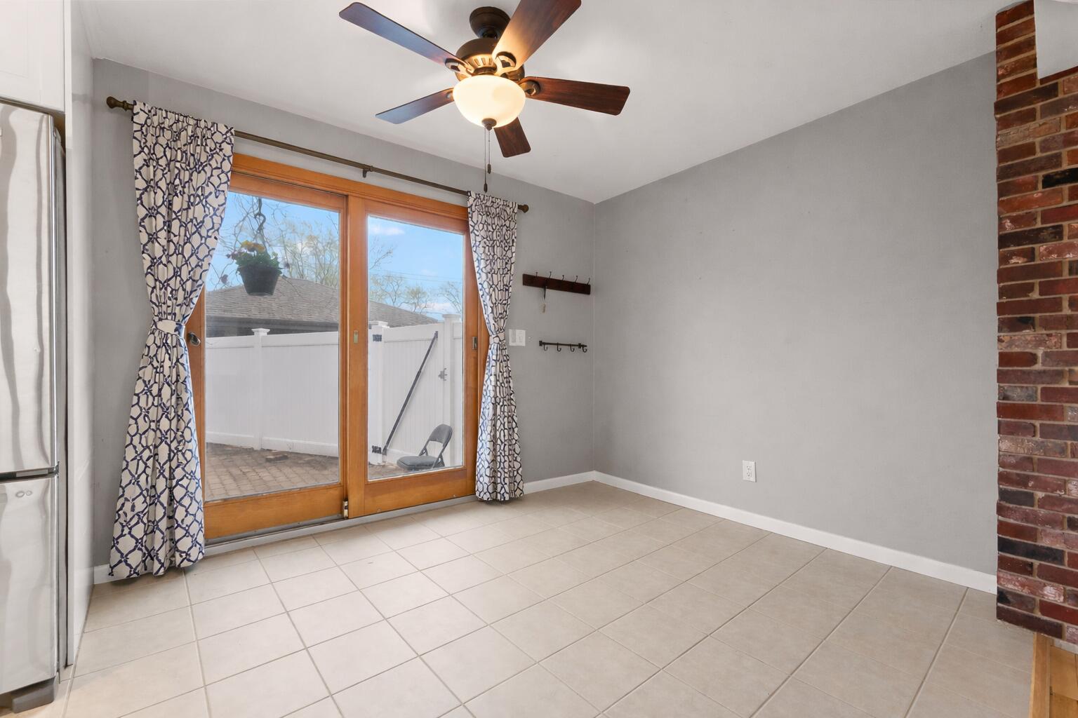 9217 Grace Street Highland, IN 46322 - Photo 7 of 29 a view of an empty room with a window
