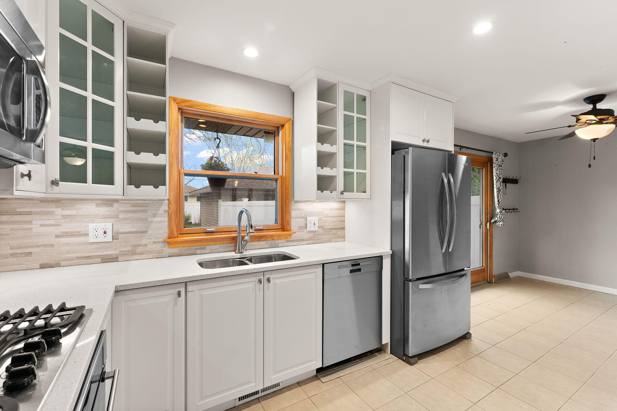 9217 Grace Street Highland, IN 46322 - Photo 10 of 29 a kitchen with a refrigerator and window