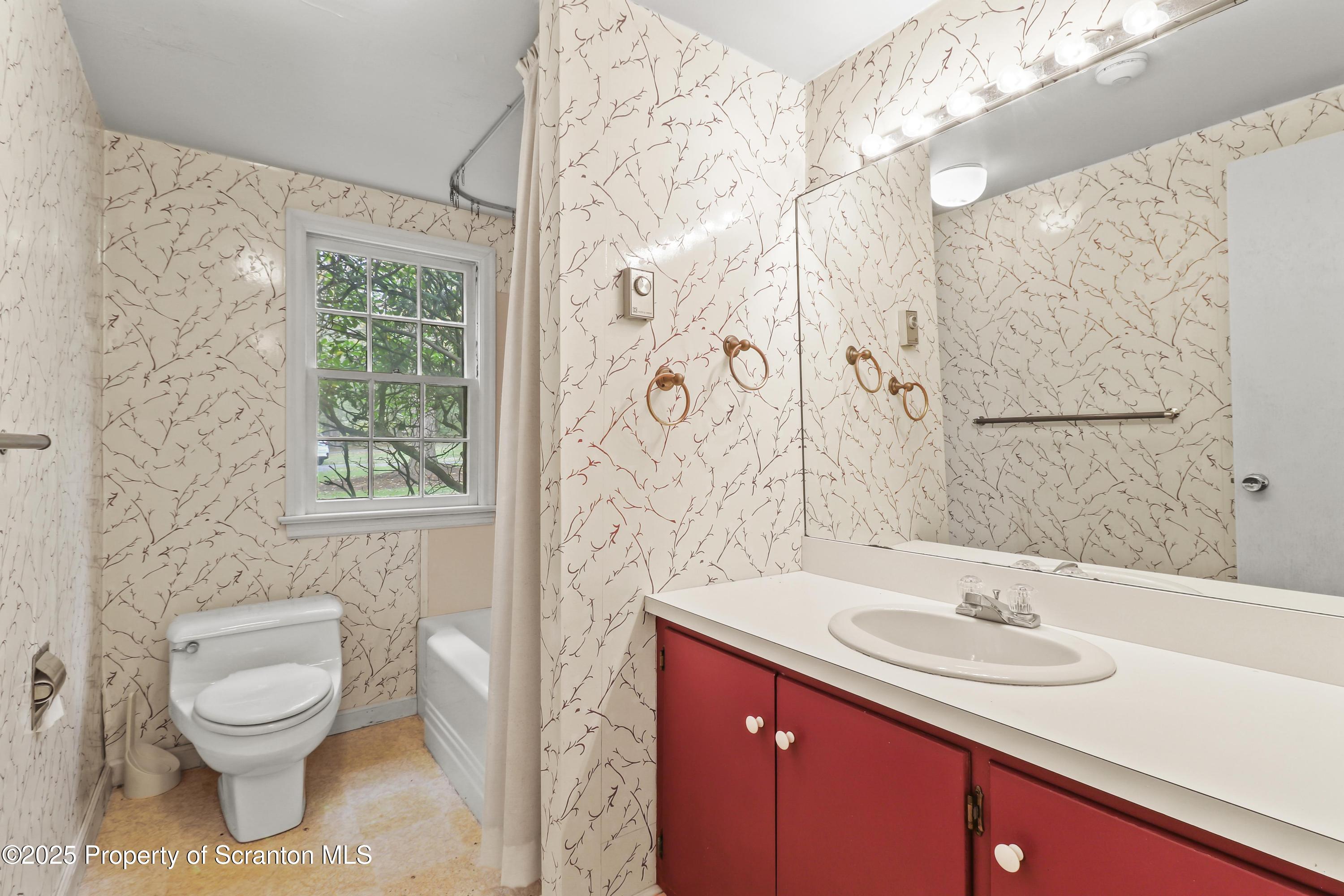 28 Church Hill Road Dalton, PA 18414 - Photo 16 of 63 a bathroom with a sink toilet and shower