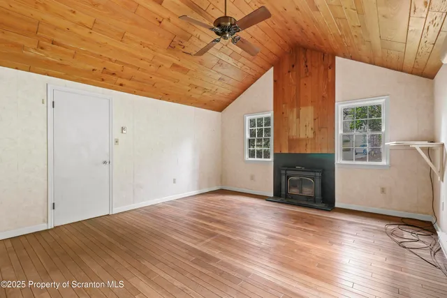 a bathroom with a sink a mirror and a shower