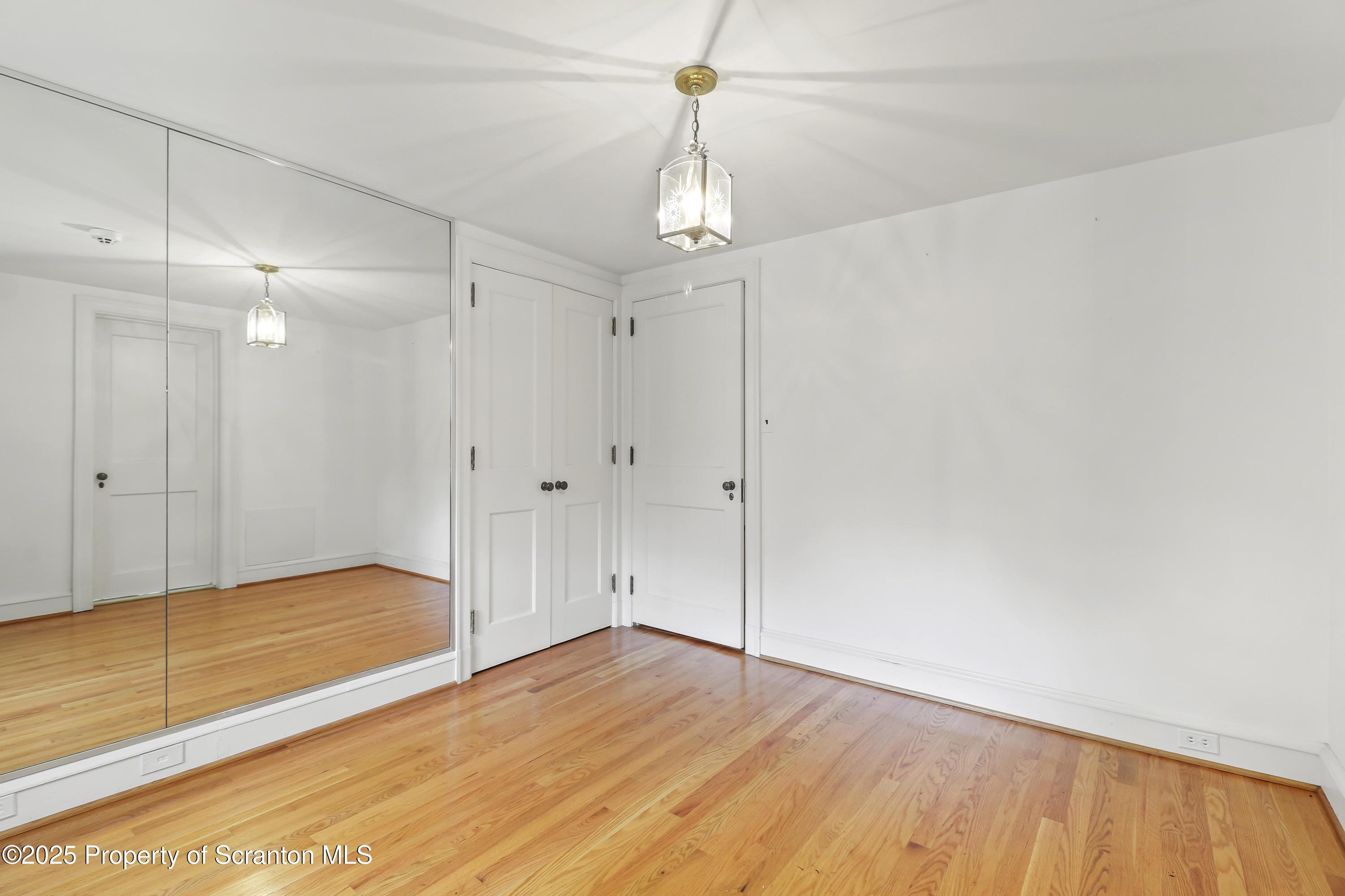 28 Church Hill Road Dalton, PA 18414 - Photo 38 of 63 a view of an empty room with wooden floor