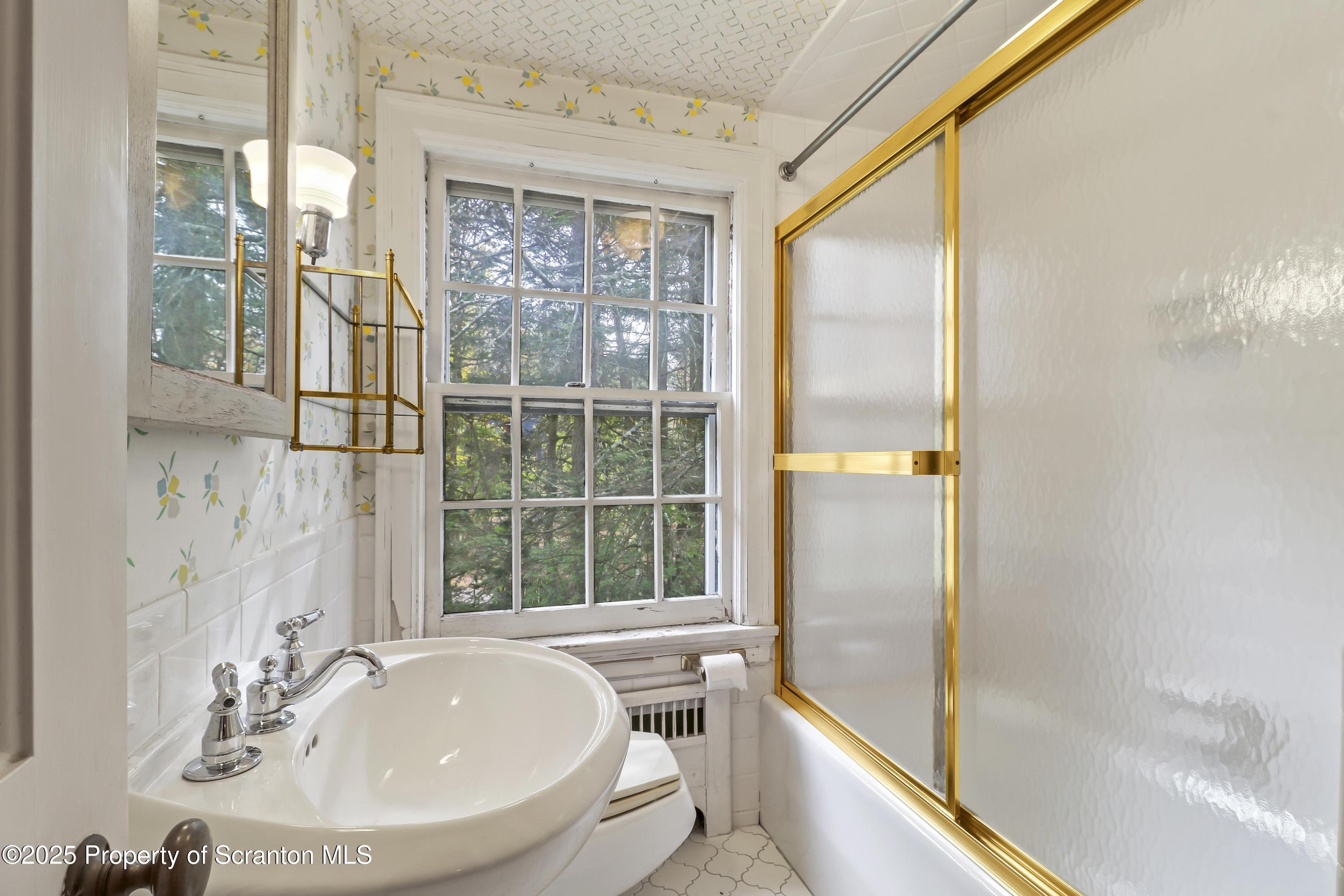 28 Church Hill Road Dalton, PA 18414 - Photo 40 of 63 a bathroom with a bathtub and a sink