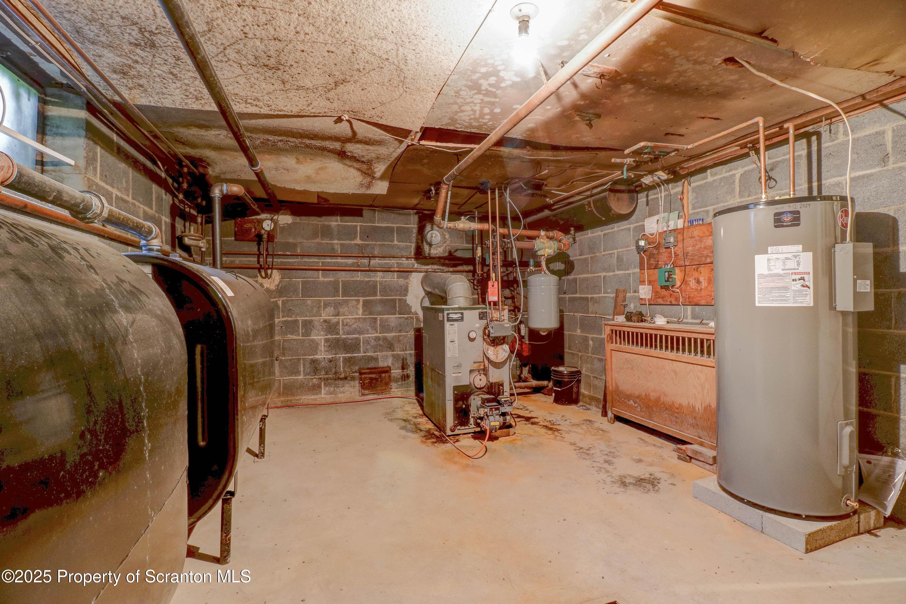 28 Church Hill Road Dalton, PA 18414 - Photo 49 of 63 a view of a storage room with racks on the wall