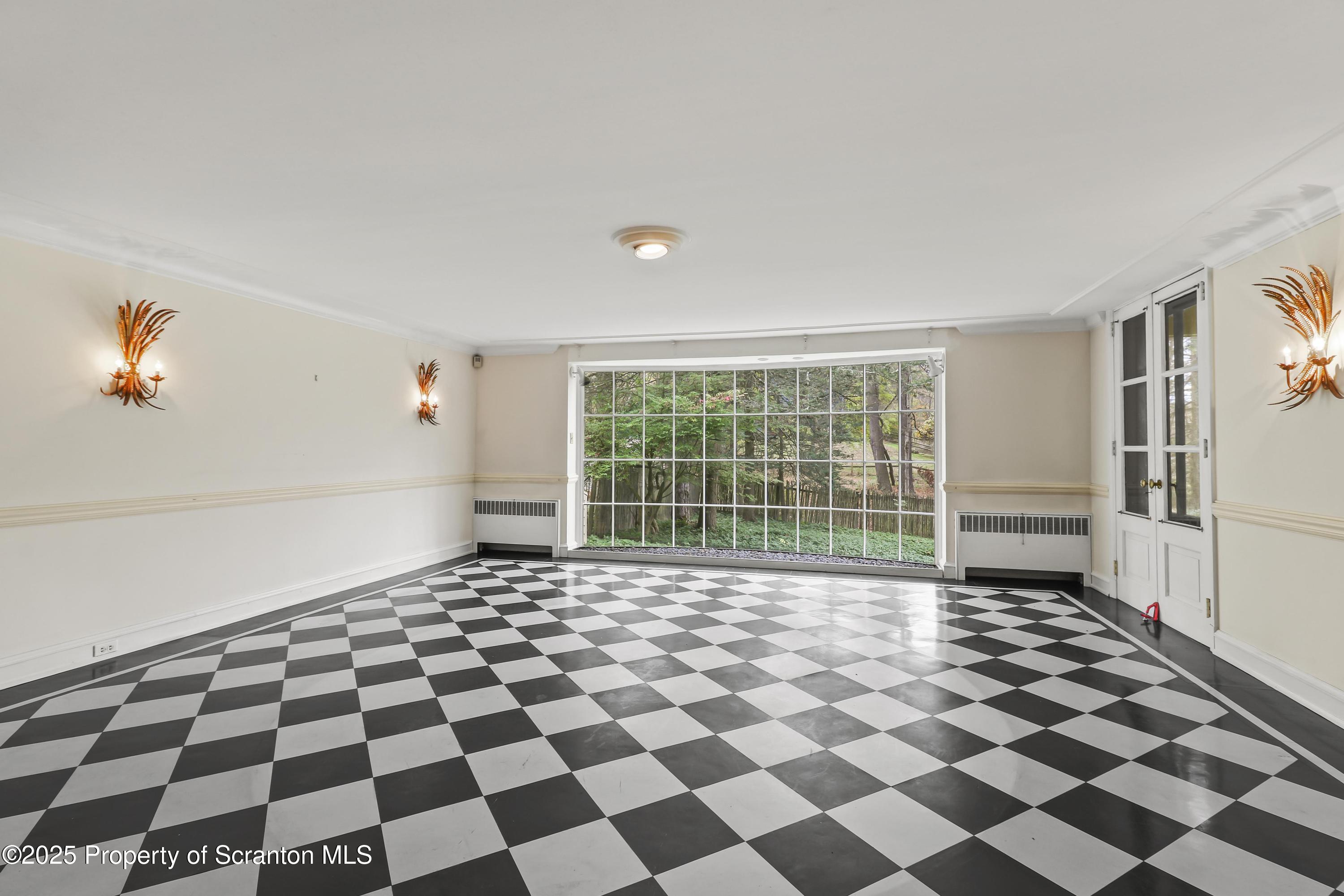 28 Church Hill Road Dalton, PA 18414 - Photo 5 of 63 a black and white checkered floor with a black white checkered floor