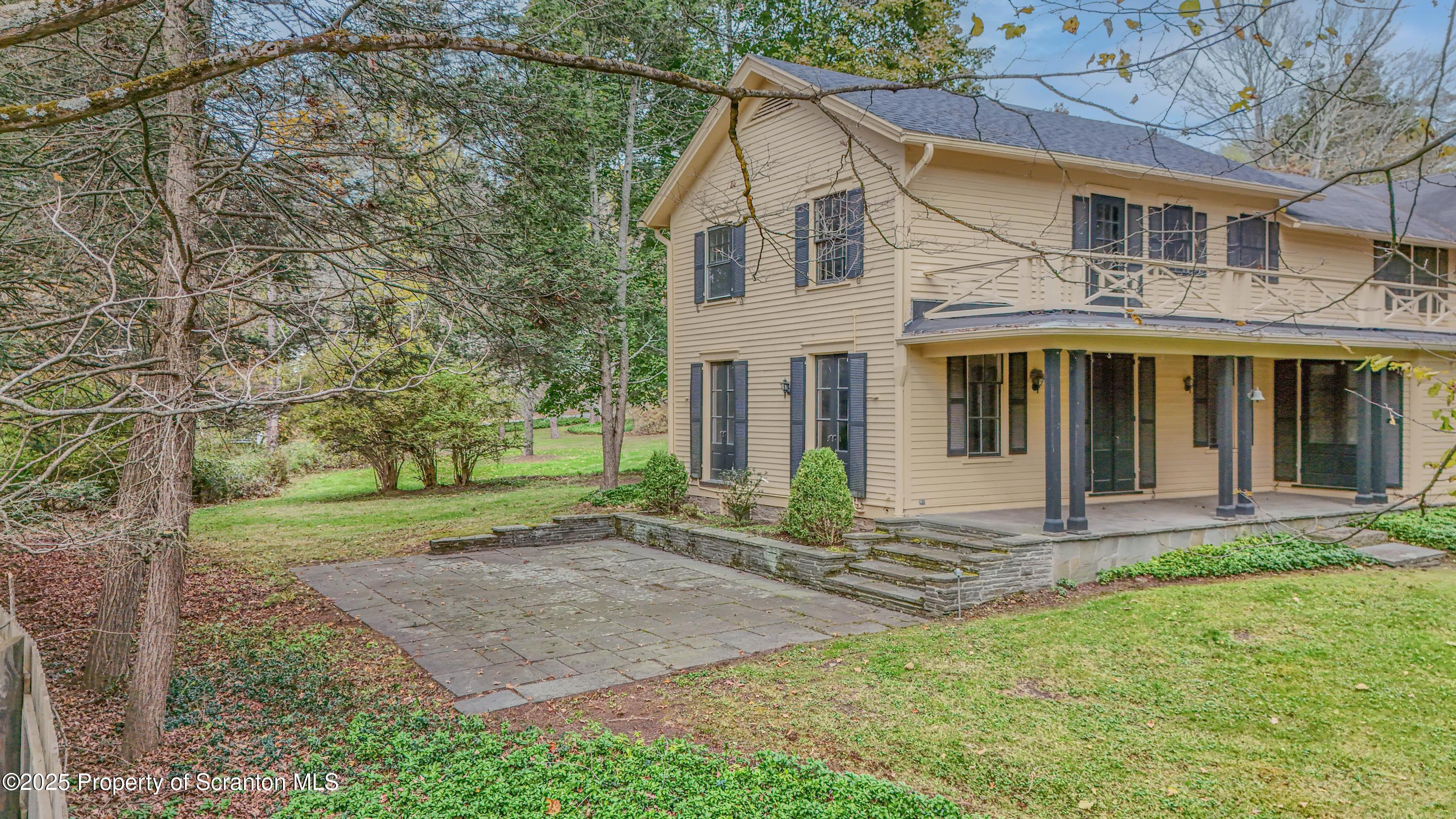 28 Church Hill Road Dalton, PA 18414 - Photo 58 of 63 a front view of a house with garden