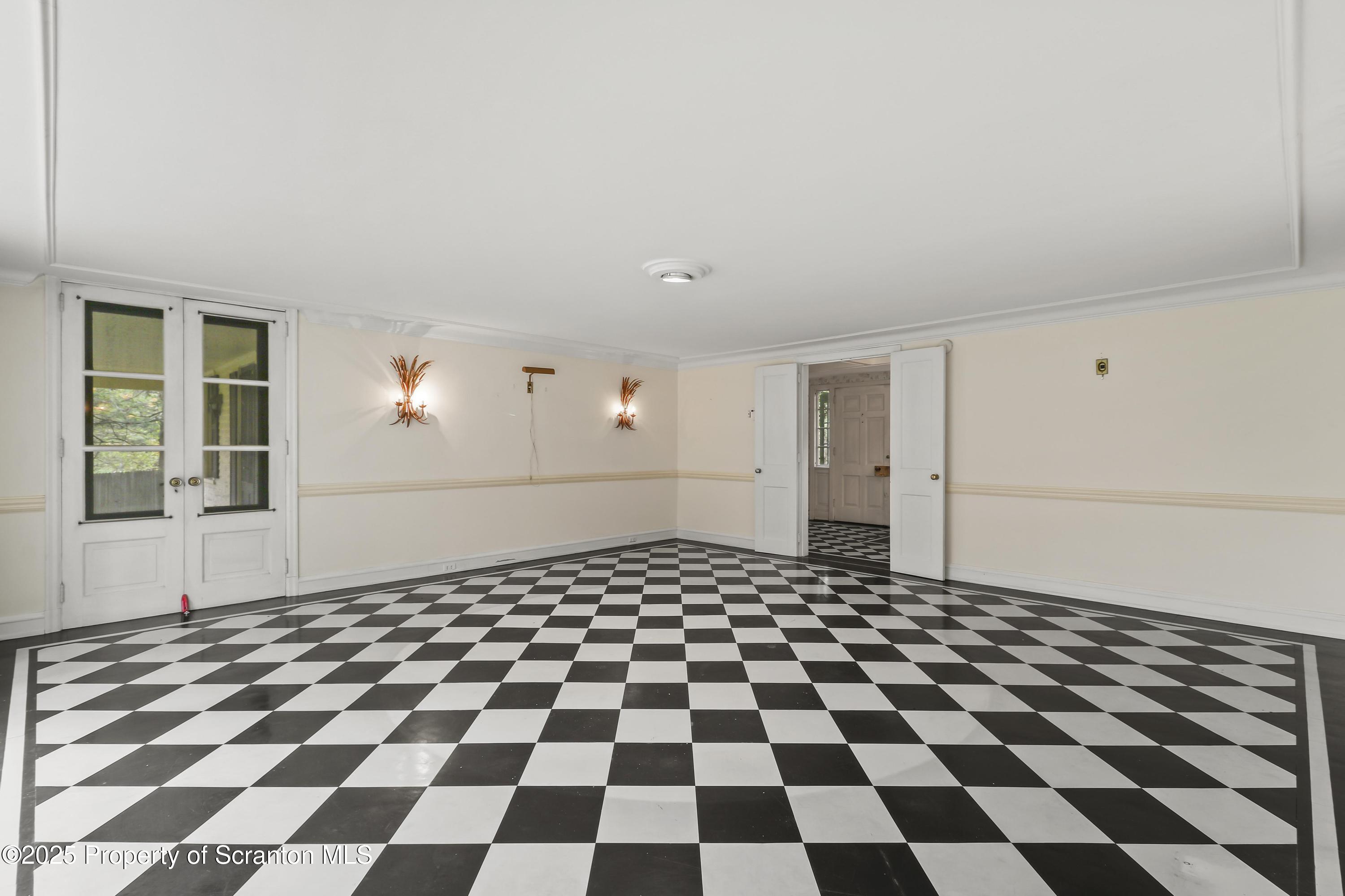 28 Church Hill Road Dalton, PA 18414 - Photo 6 of 63 a black and white checkered floor