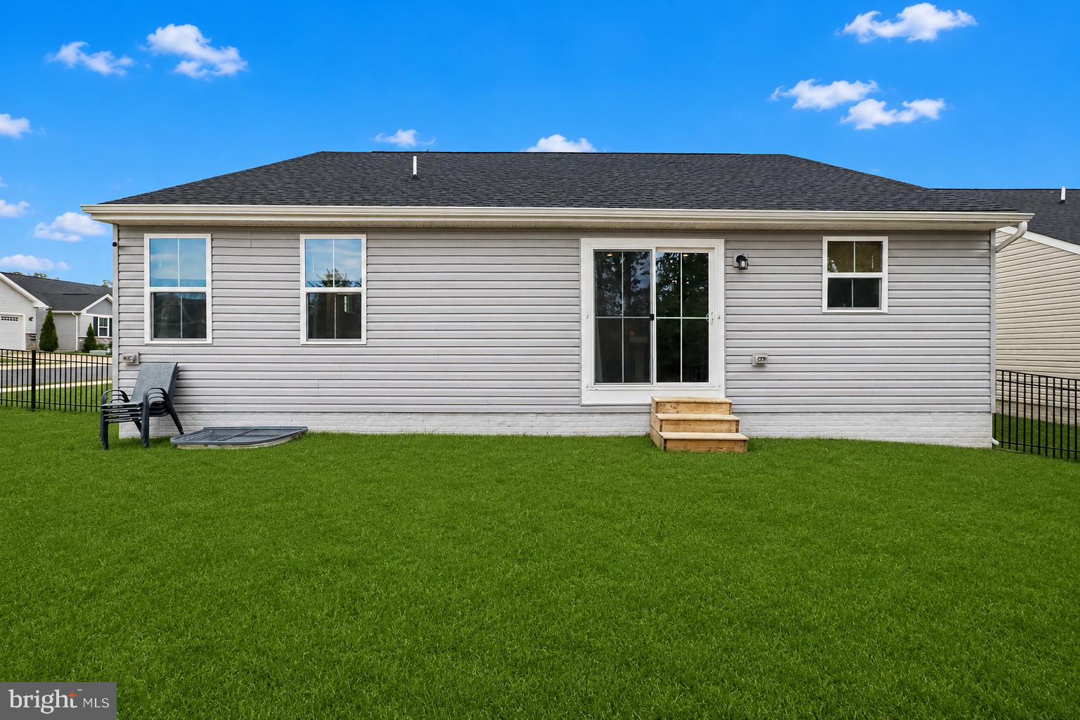 7202 Parchment Circle Ruther Glen, VA 22546 - Photo 28 of 30 a front view of a house with a garden