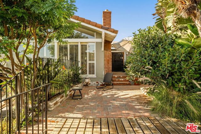 a view of house with yard