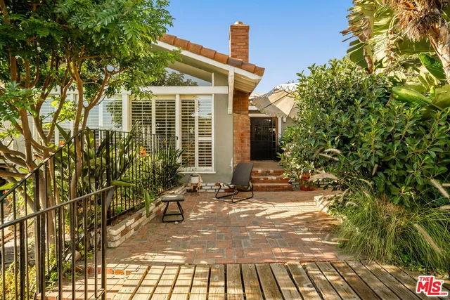 a view of house with yard