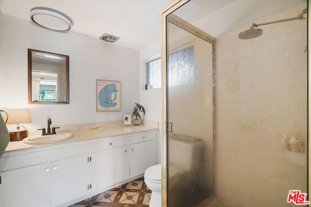 a view of a swimming pool with a lounge chairs