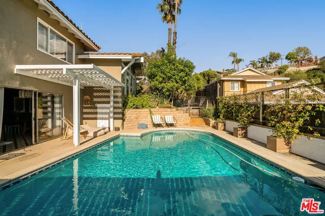 a house view with a outdoor space