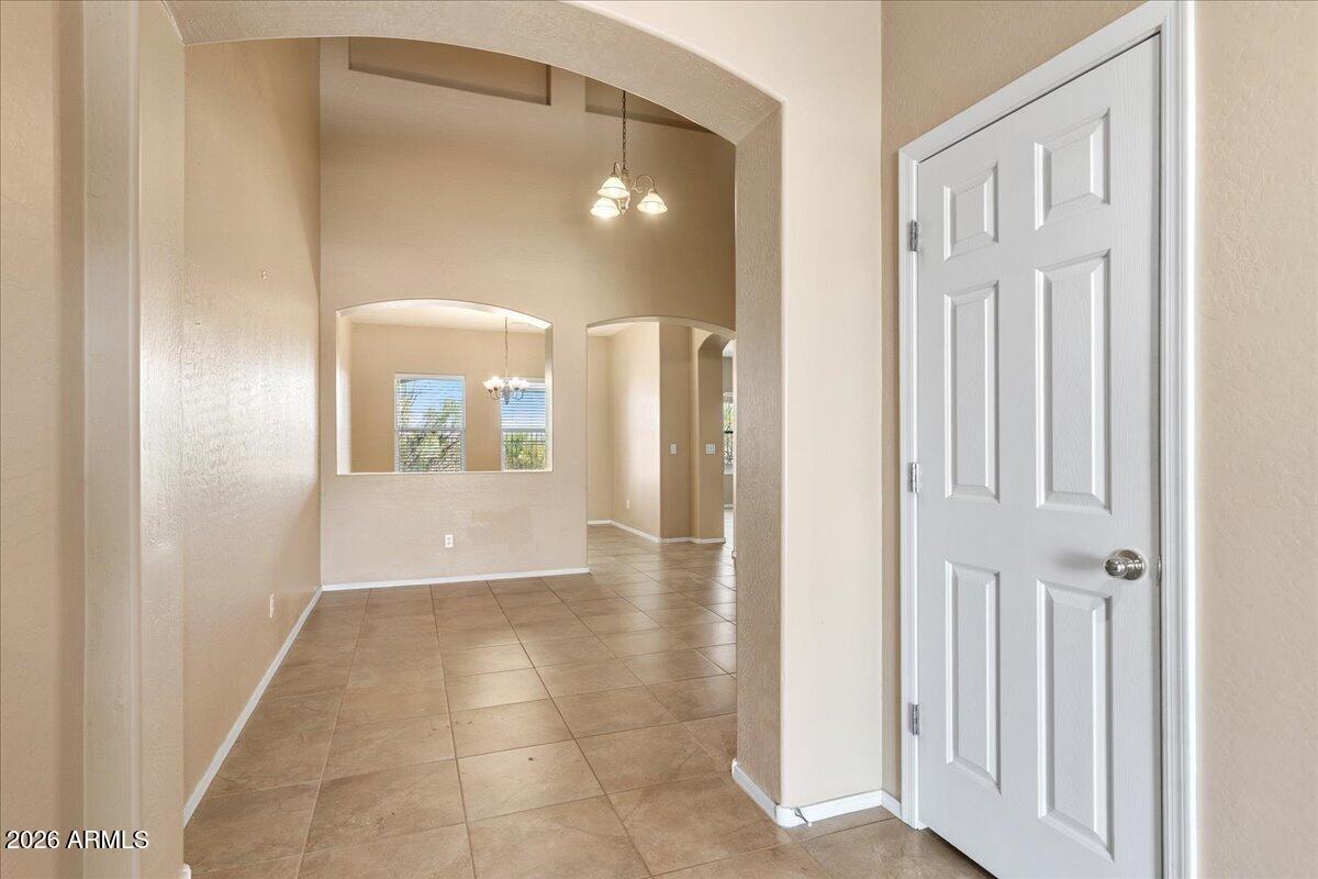 813 Alfonse Road Clarkdale, AZ 86324 - Photo 6 of 41 a view of a hallway with wooden floor