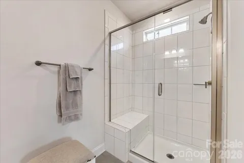 a view of storage and utility room with washer and dryer