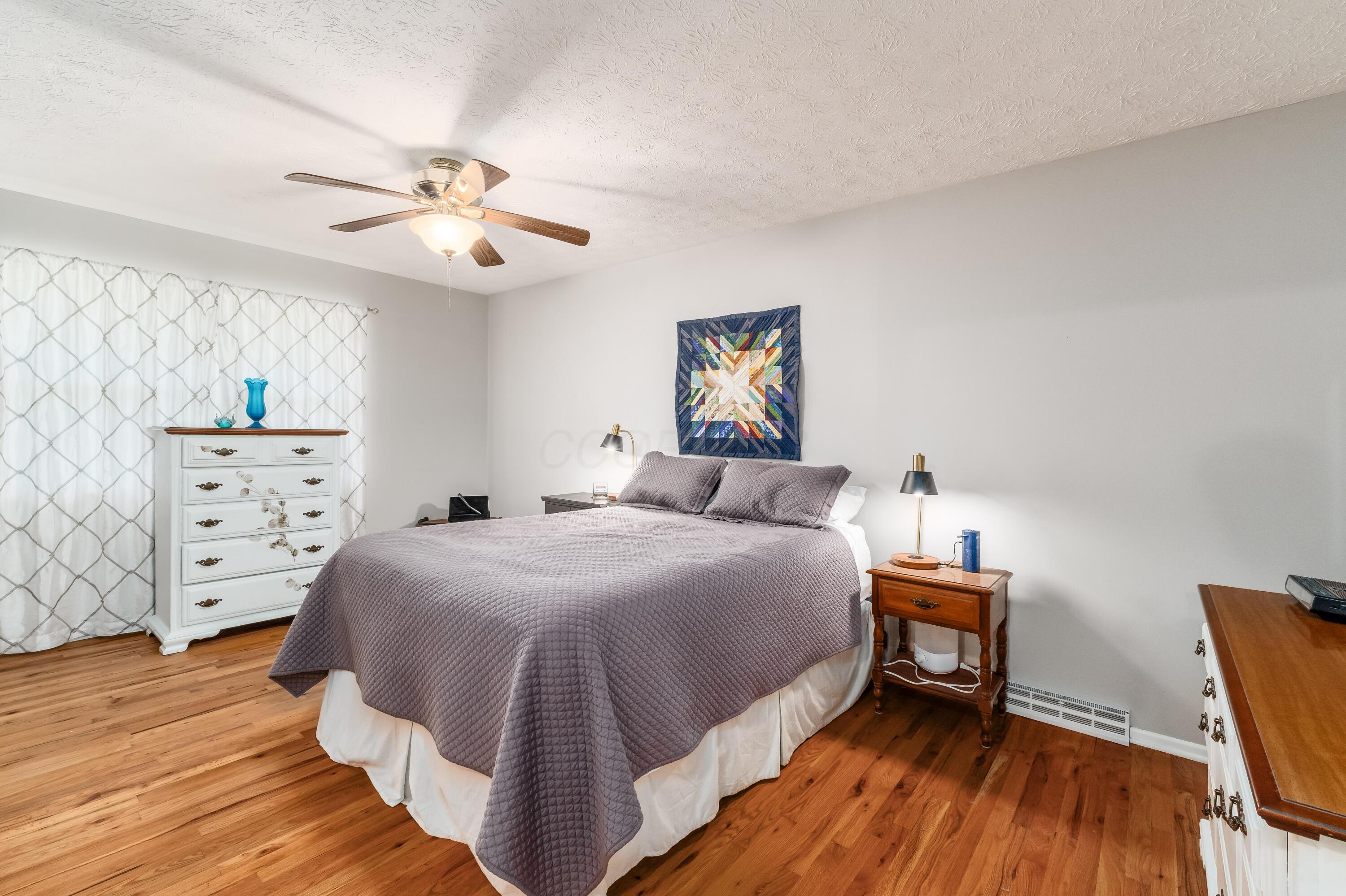 5568 Naiche Road Columbus, OH 43213 - Photo 22 of 42 Sprawling primary suite serves as a massive private retreat, offering an abundance of space