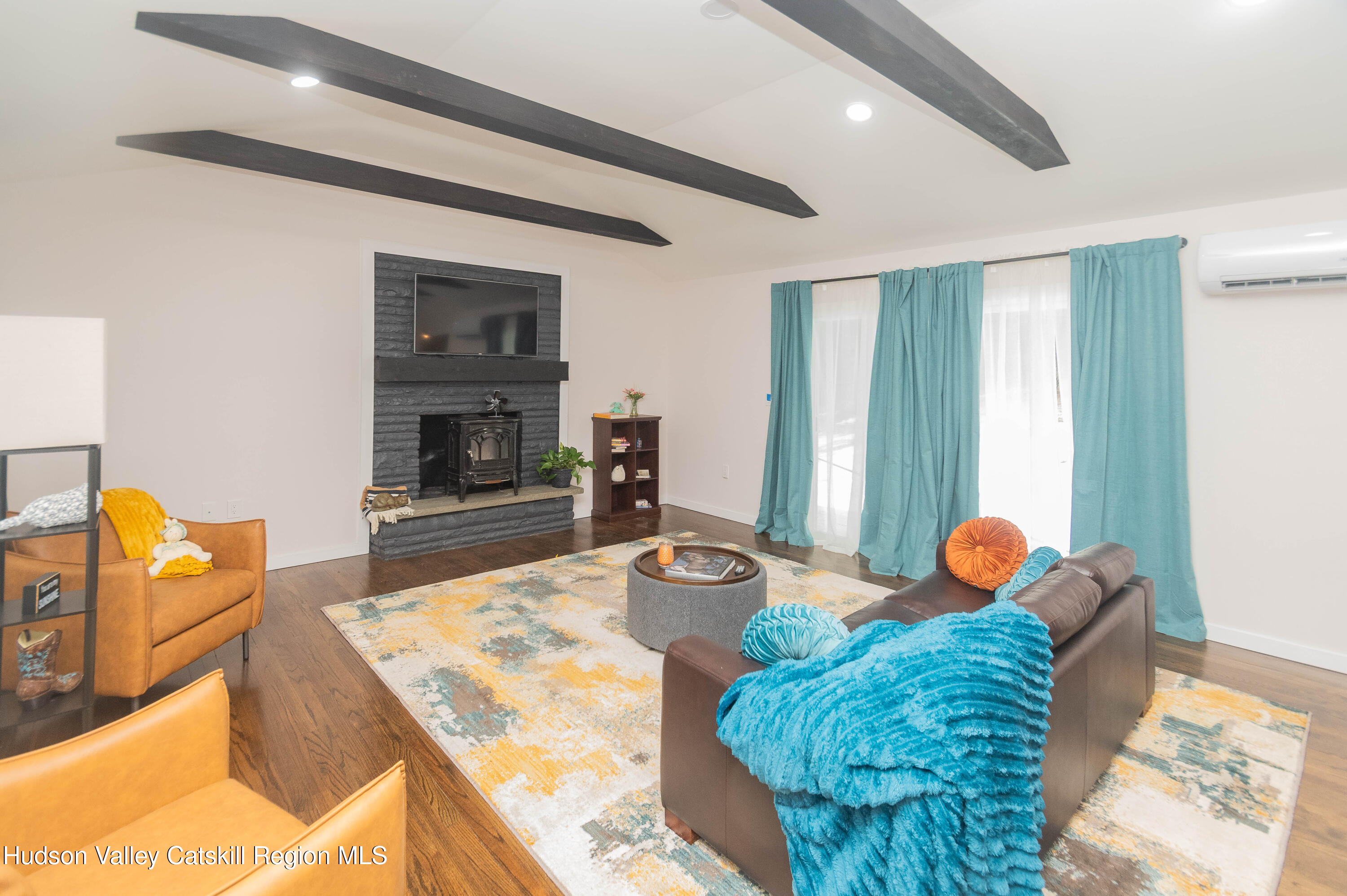 183 Mill Road Olivebridge, NY 12461 - Photo 14 of 30 a living room with furniture and a fireplace