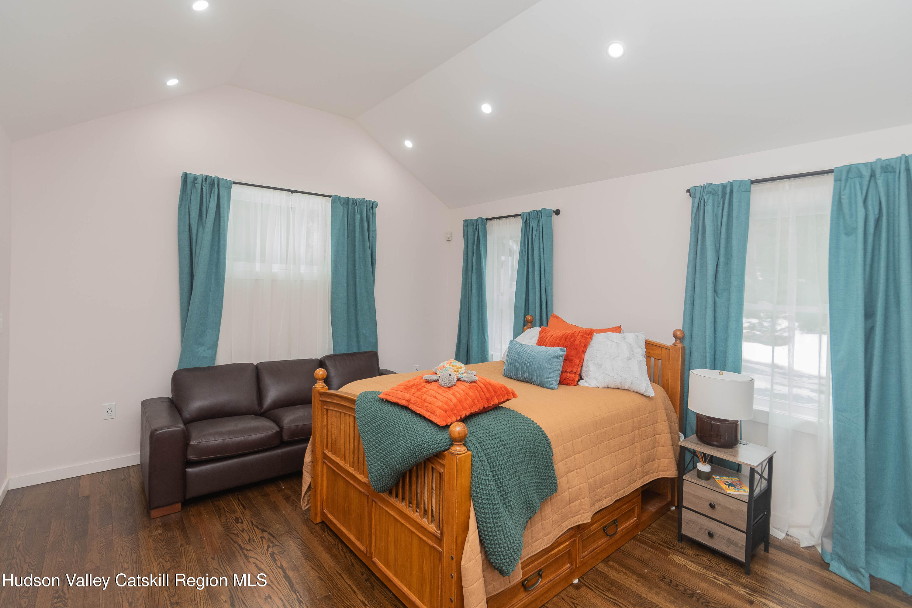 183 Mill Road Olivebridge, NY 12461 - Photo 20 of 30 a bedroom with a bed and a couch