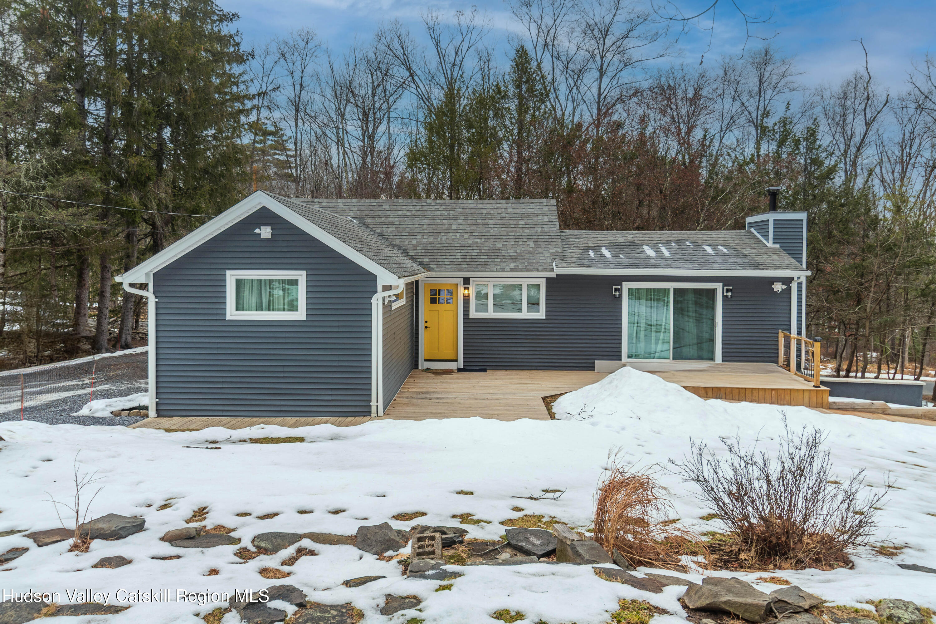 183 Mill Road Olivebridge, NY 12461 - Photo 6 of 30 a front view of a house with a yard covered in snow
