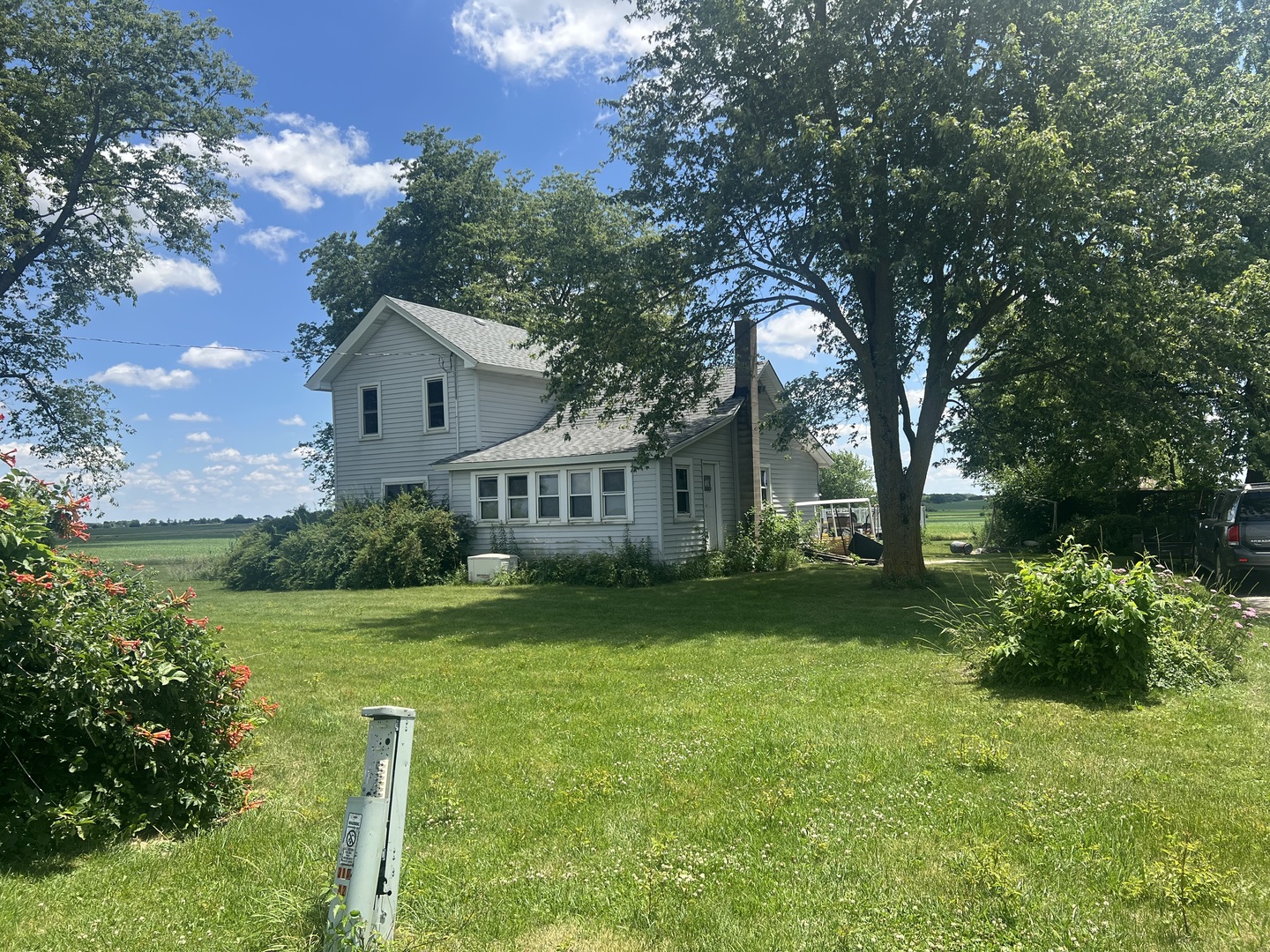 11531 West Pauling Road Manhattan, IL 60442 - Photo 1 of 3 a front view of a house with garden
