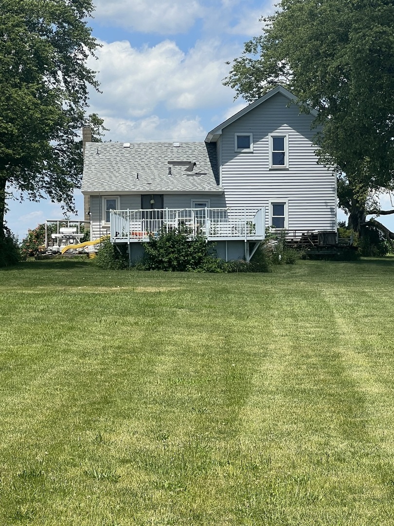 11531 West Pauling Road Manhattan, IL 60442 - Photo 2 of 3 a front view of a house with garden