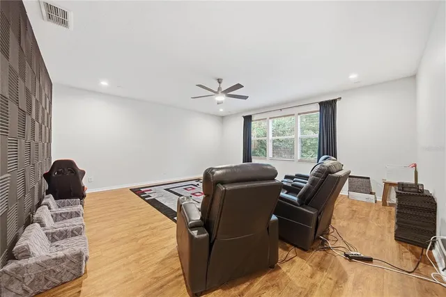 a work room with furniture and windows