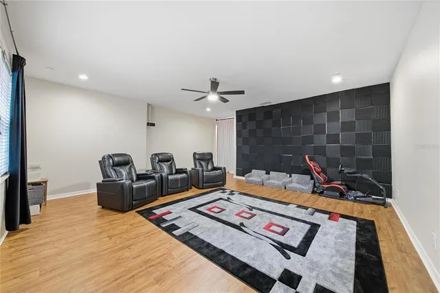 a living room with furniture and a rug