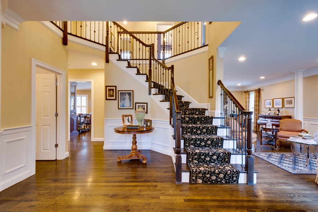 24 Fletcher Road Needham, MA 02492 - Photo 2 of 29 a view of entryway and hall with wooden floor