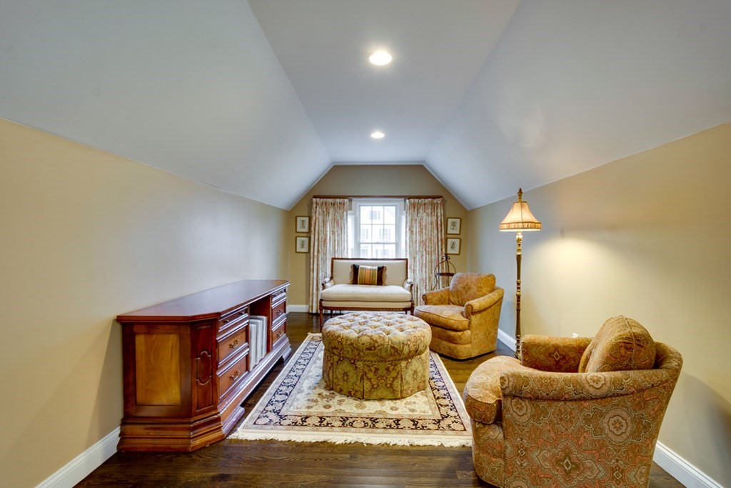 24 Fletcher Road Needham, MA 02492 - Photo 21 of 29 a living room with furniture and a window