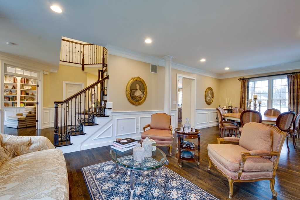 24 Fletcher Road Needham, MA 02492 - Photo 4 of 29 a living room with furniture and a large window