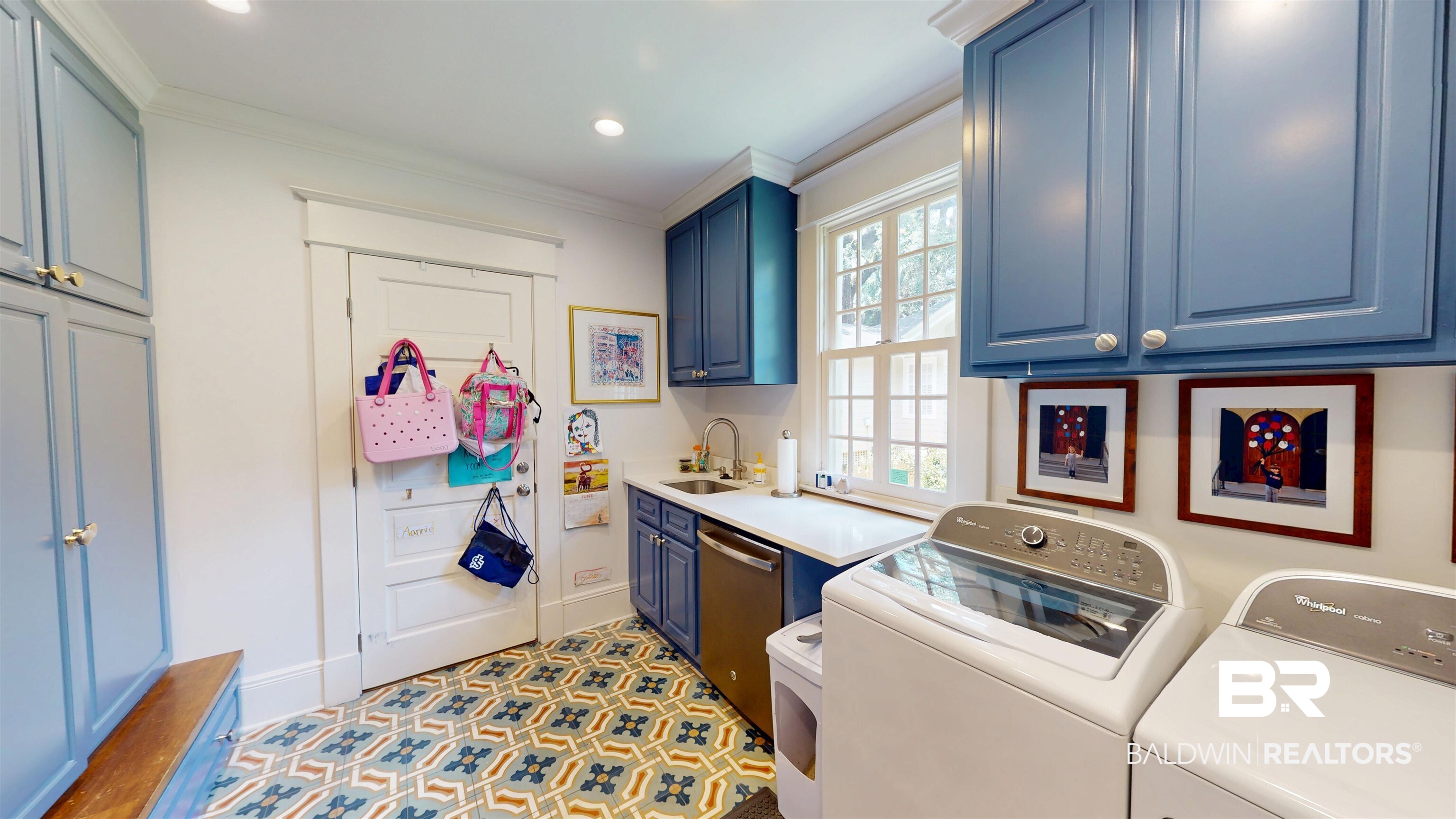 211 Lanier Avenue Mobile, AL 36607 - Photo 30 of 73 Laundry room with crown molding, washing machine and clothes dryer, cabinet space, and recessed lighting