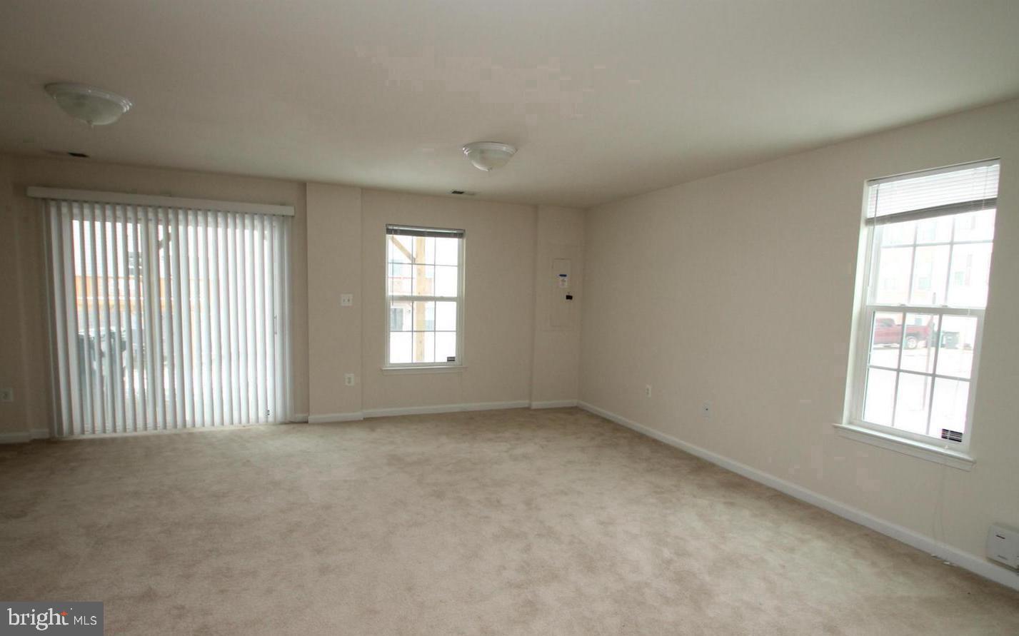 313 Brenton Road, Unit 40 Fredericksburg, VA 22405 - Photo 6 of 18 Spacious, light-filled living area.