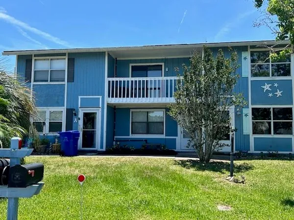 a front view of house with yard